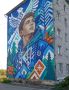 Новый портретный мурал появился на фасаде дома №22 по ул. Строителей в Няндоме — и это по-настоящему впечатляющее украшение города!