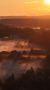 В области Архангельск, в России , там, где река Онега впадает в море, можно наблюдать закат над горой Жеребцова